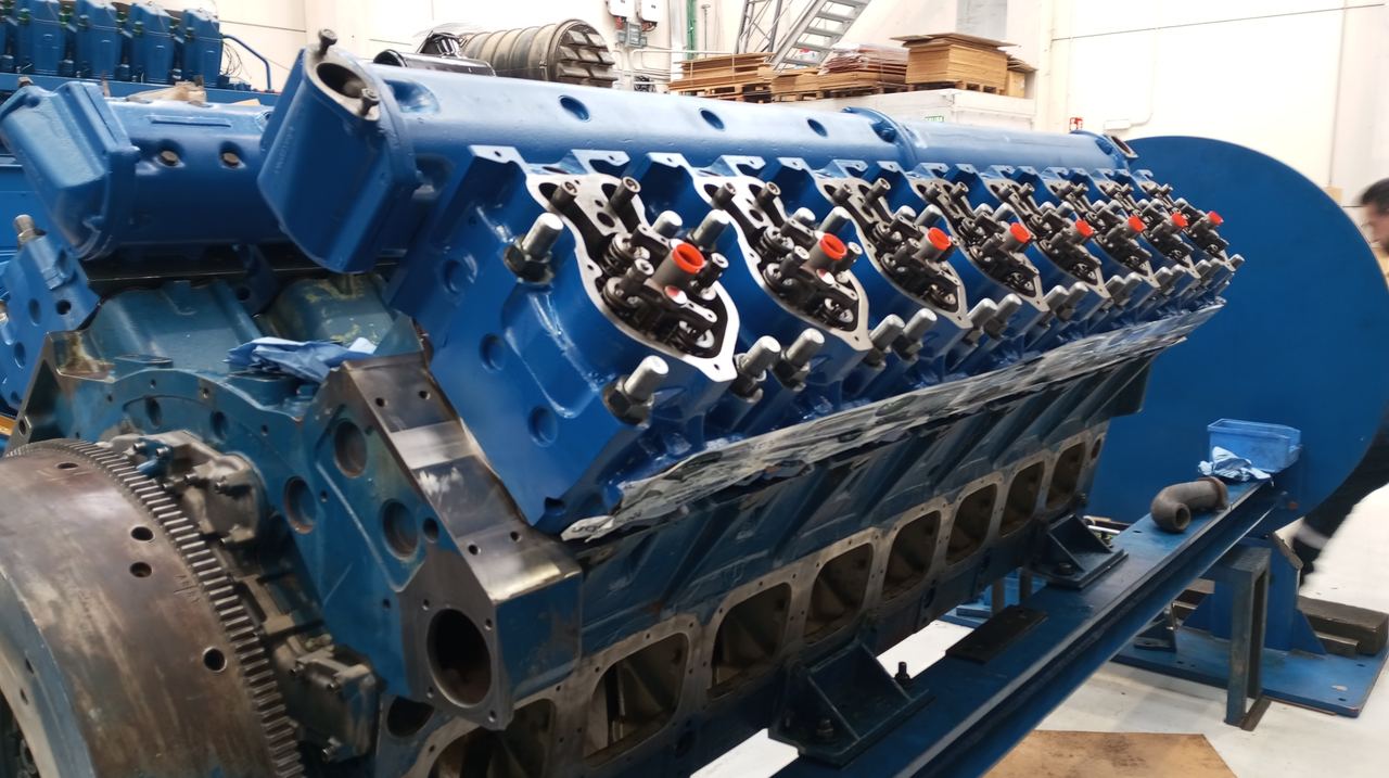 Reconditioned MWM TBG 620 V16 cylinder heads ready for assembly
